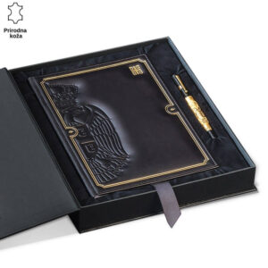 Crna kožna beležnica sa stilizovanom zlatnom bordurom i reljefom krune