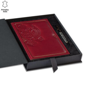 Crvena kožna beležnica sa reljefnim motivima