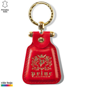 Crveni kožni privezak sa zlatnim logotipom Princ Leather i zlatnim detaljima.
