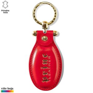 Crveni kožni privesak sa zlatnim detaljima i logotipom Princ Leather.