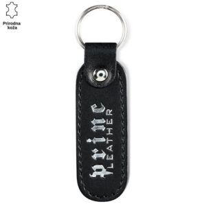 Crni kožni privesak sa logom Princ Leather štampanim belim slovima.