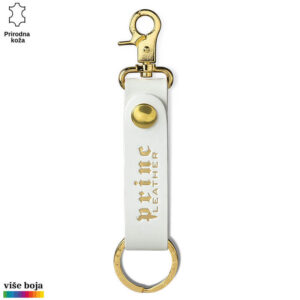 Beli kožni privezak sa zlatnim detaljima i natpisom "Princ Leather".