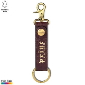 Kožni privezak sa zlatnim kopčama i logom Princ Leather.
