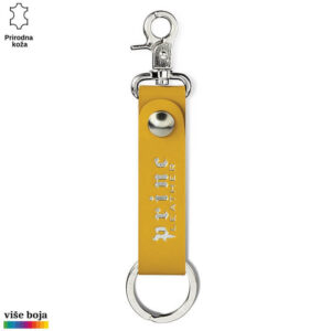 Žuti kožni privezak sa metalnom kopčom i prstenom