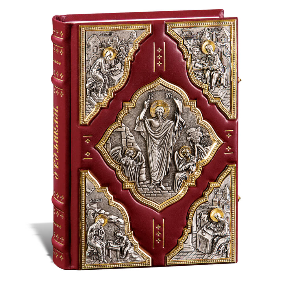 jevandjeljeokovlux Kožna knjiga crvene boje sa izraženim reljefnim ikonama svetaca na koricama.